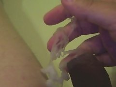 Playing Cum from Tiny Uncut Foreskin Cock in the water
