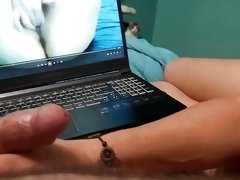 Bella giving housemate handjob while watching porn