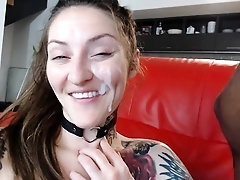 Tattooed brunette gets drilled and facialized by a black guy