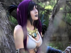 Sultry brunette in costume flaunts her curves in the woods