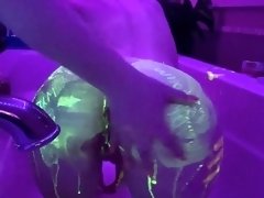 Kinky lesbian friends have fun with sex toys in the hot tub
