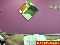 Busty asian masseuse tugs for a extraen tip